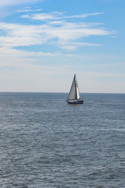 Sailboat sailing in the open sea