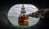 Tug boat pulling a vessel